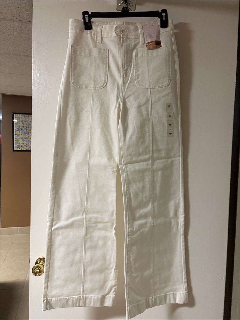 NWT Lauren Conrad super high rise Flare jeans size 8 short in white.